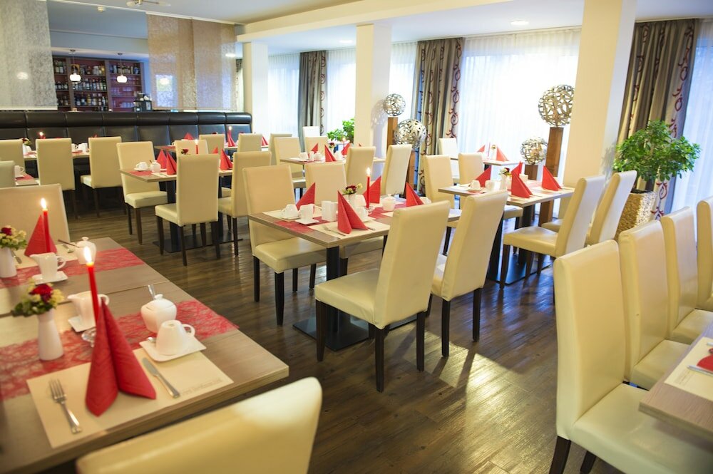 Фото Hotel Rödelheimer Hof - Am Wasserturm