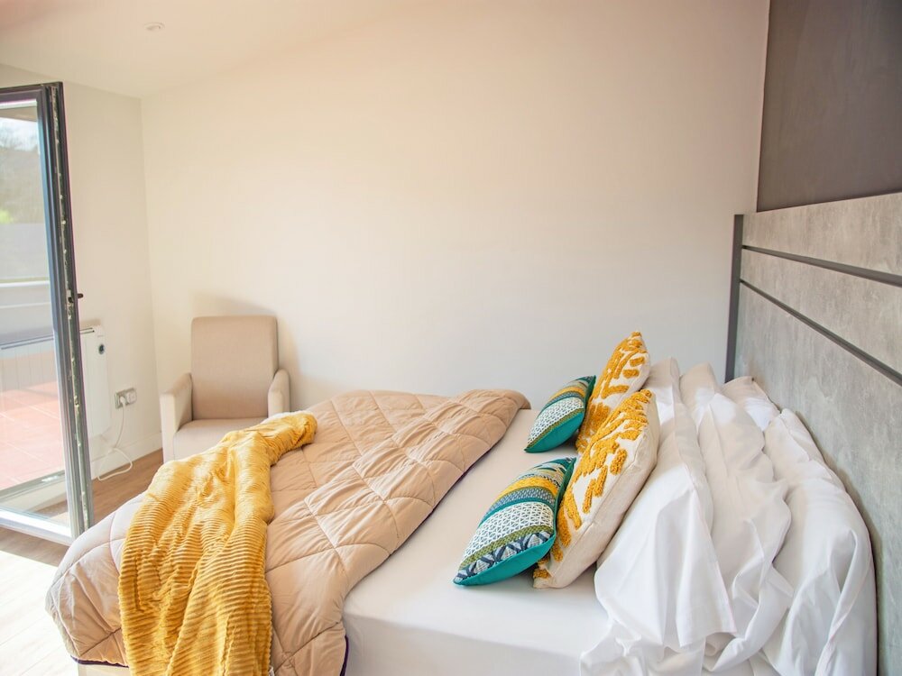 Фото Apartmentos Santander Maliaño Suites 3000