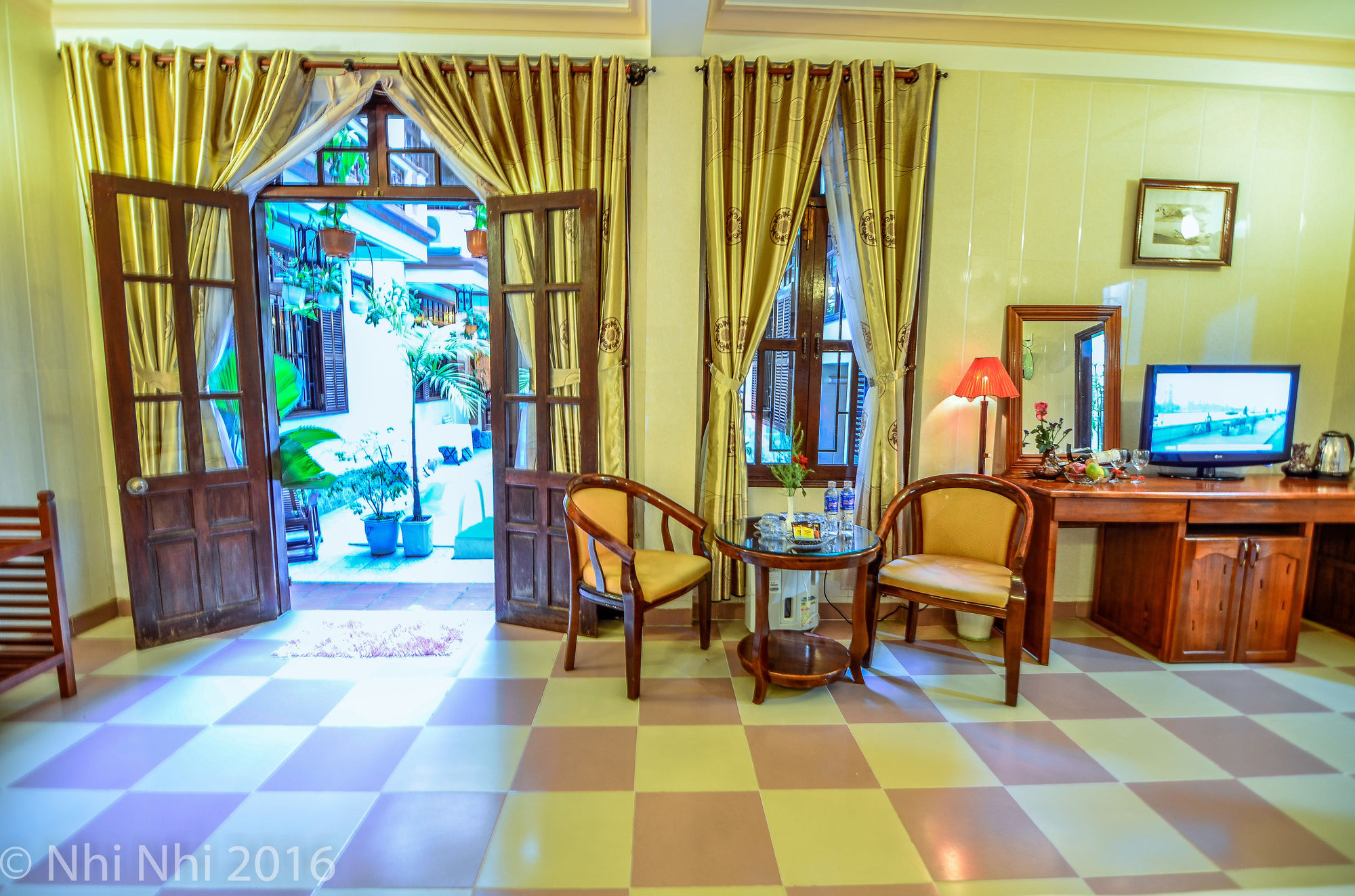 Фото Hoi An Nhi Nhi Hotel