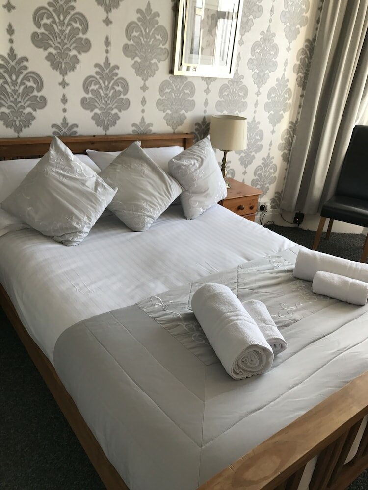 Фото Queens Plaza Hotel