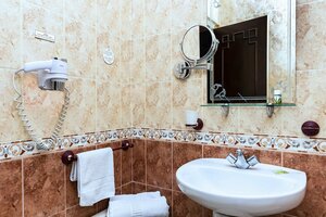 Гостиница Amani Hotel Suites & SPA