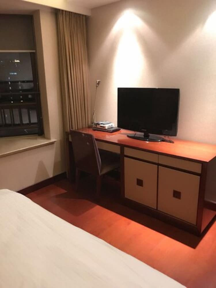 Фото Jing'an Ziyuan Apartment Hotel