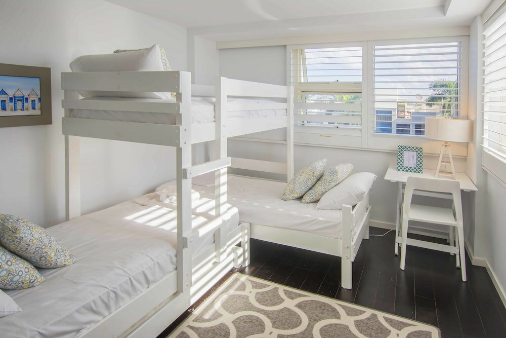 Фото 84 The Spit Holiday Apartments