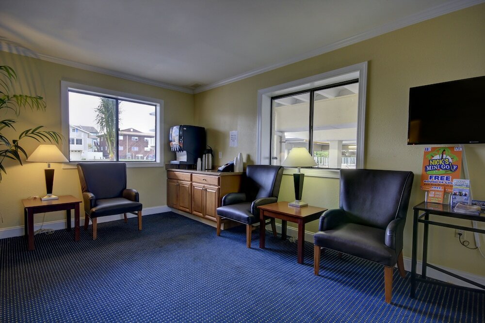 Фото Coastal Palms Inn & Suites