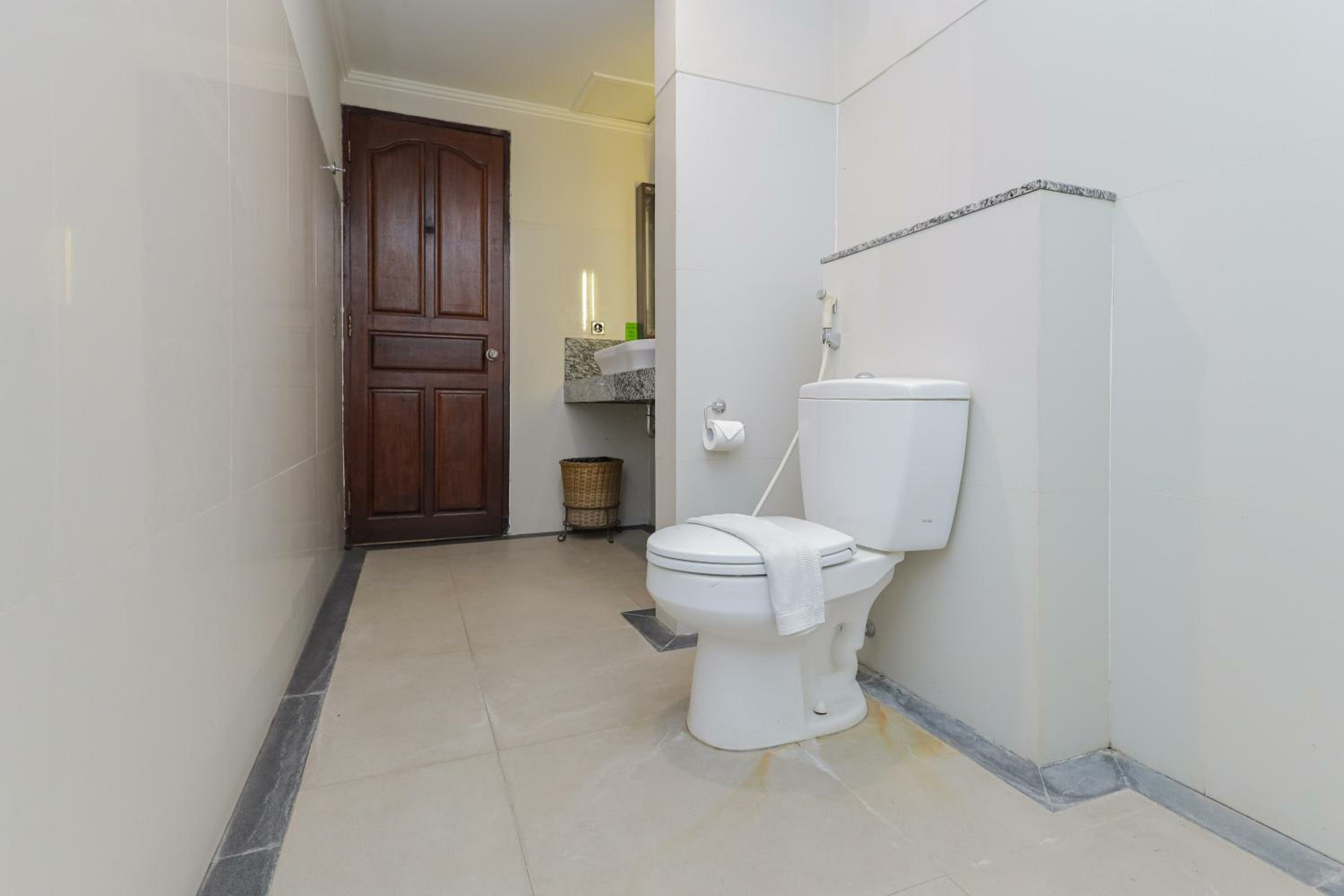 Фото Urbanview Hotel Taman Suci Denpasar Bali