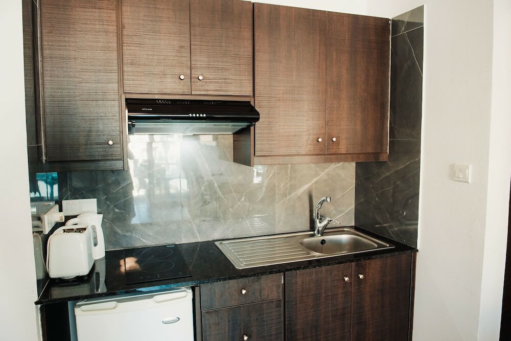 Фото A. Maos Hotel Apartments