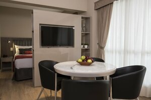 Апартаменты Arc Arenales Studios & Suites