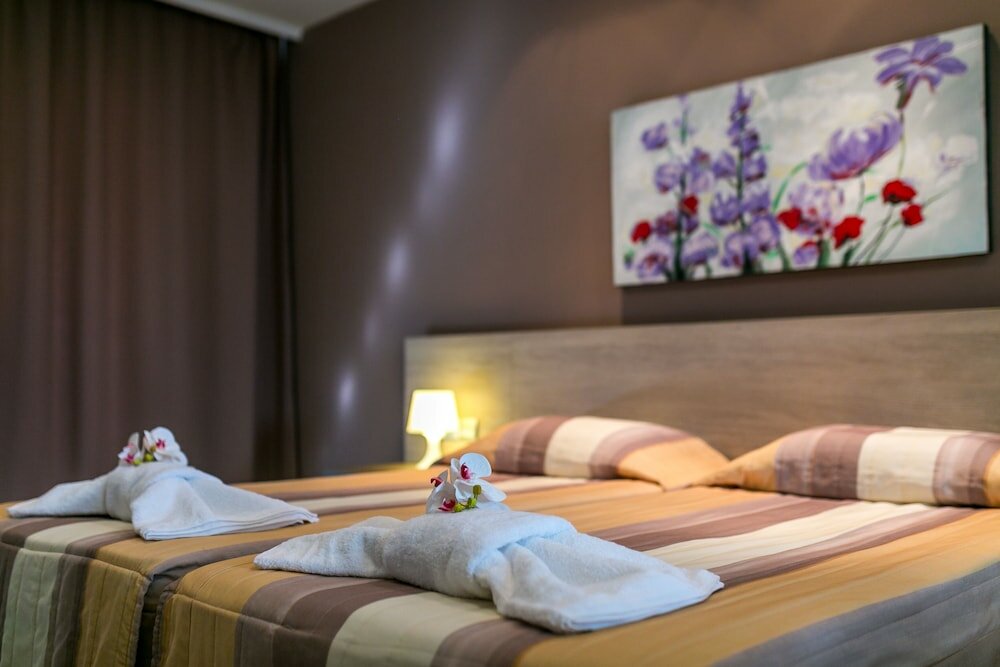 Фото Crystallo Apartments