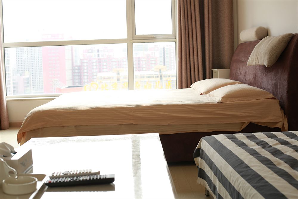 Фото China Sunshine Apartment Dacheng International