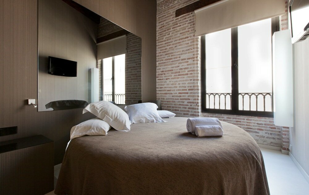 Фото Cosy Rooms Embajador