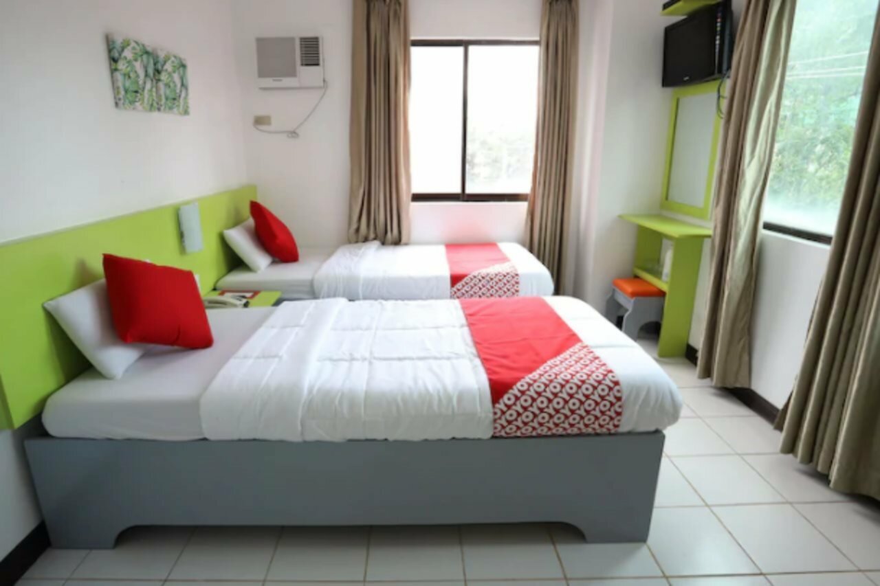 Фото Oyo 210 Apple Tree Suites