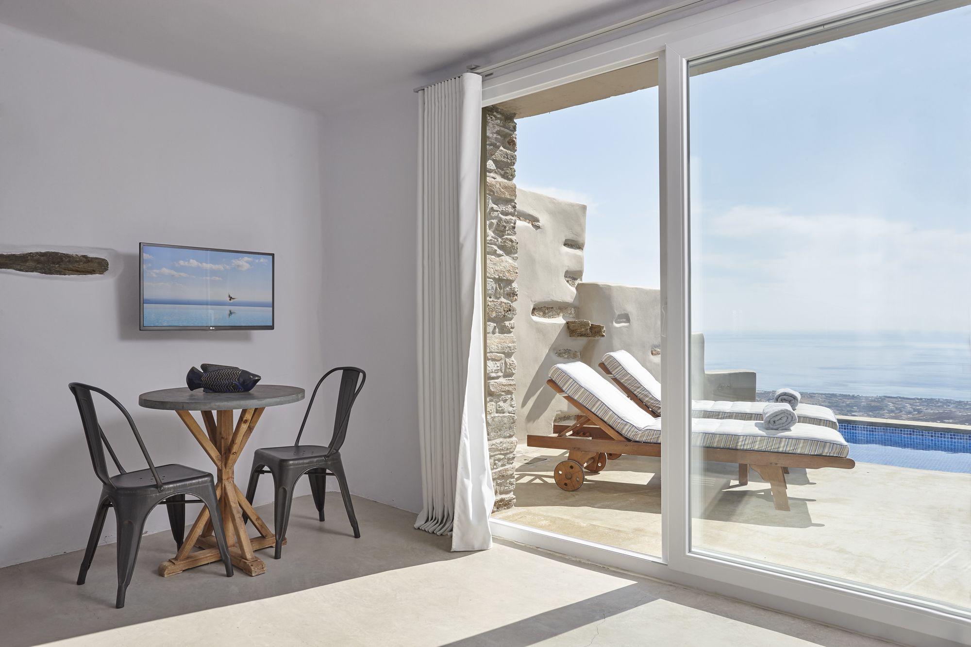 Фото Aeolis Tinos Suites