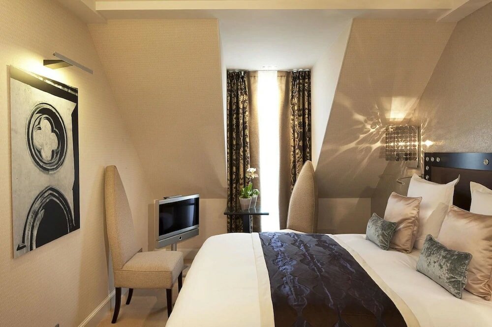 Фото Hôtel Le Petit Paris