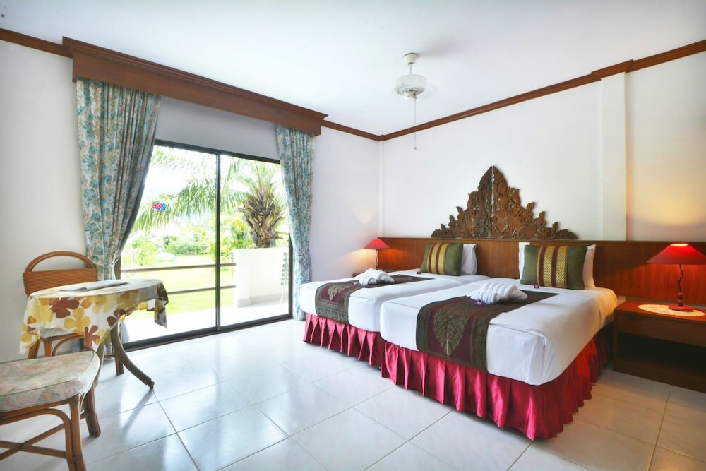 Фото Patong Palace Hotel