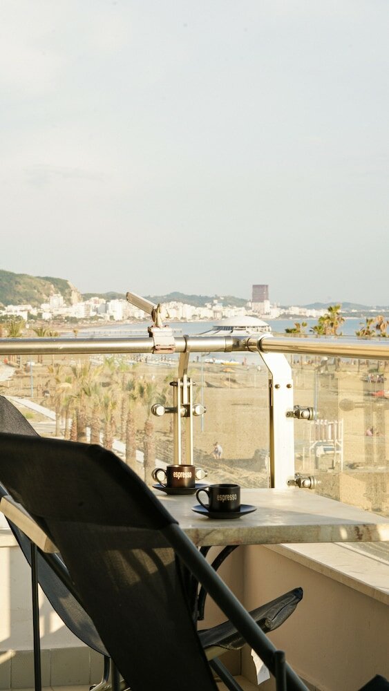 Фото The Beachfront Apartment