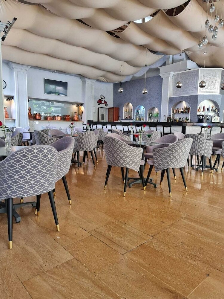 Фото El Oumnia Puerto & SPA