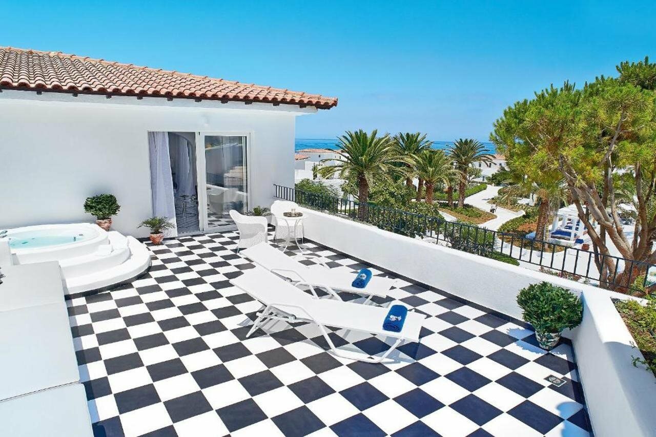 Фото Caramel Grecotel Boutique Resort