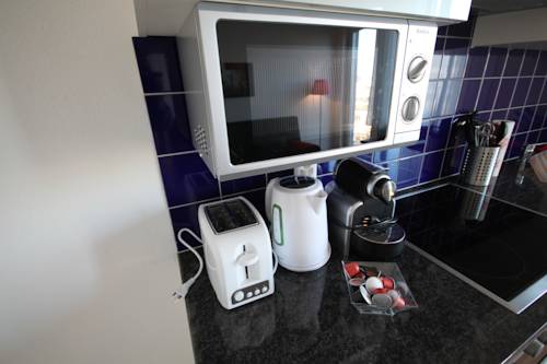 Фото HITrental Letzigrund - Apartment