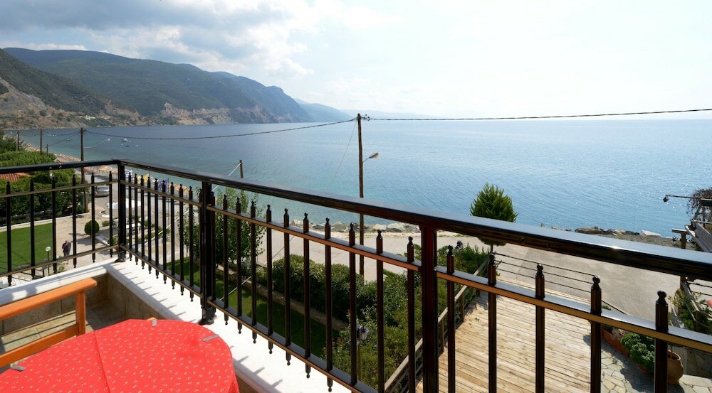 Фото Отель Pharos Rooms