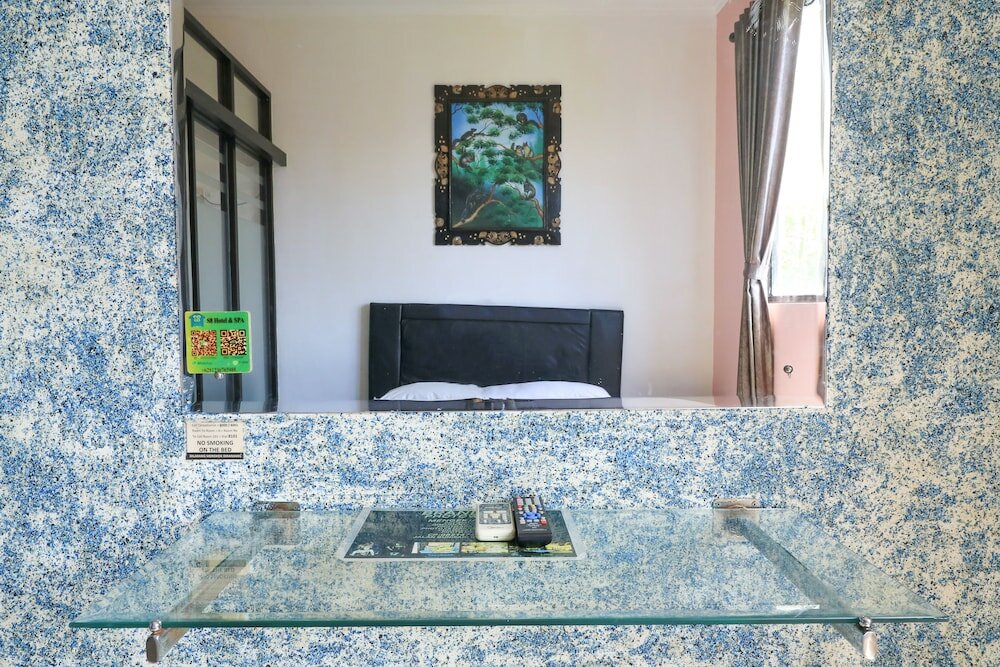 Фото S8 Suardana Hotel