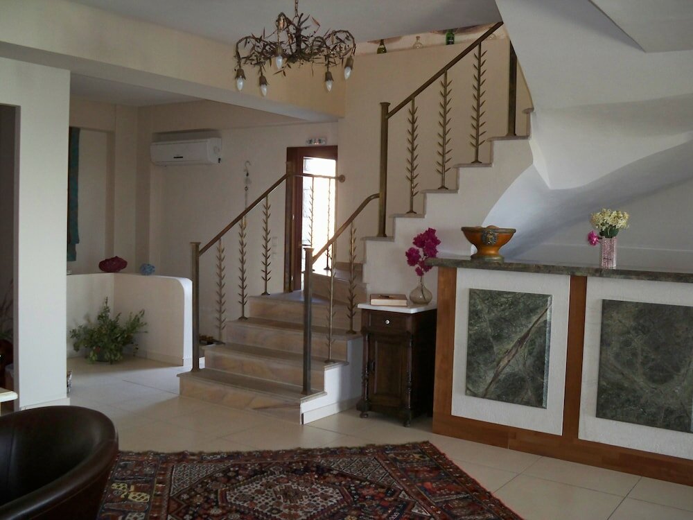 Фото Porto Mani Suites