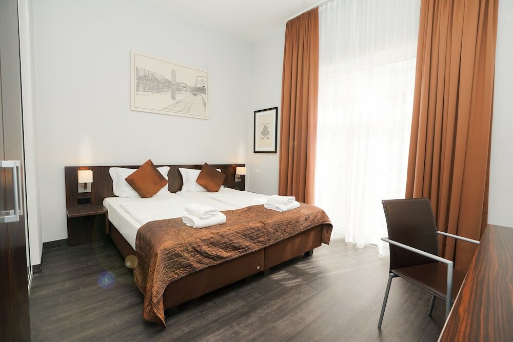 Фото The Atrium Hotel