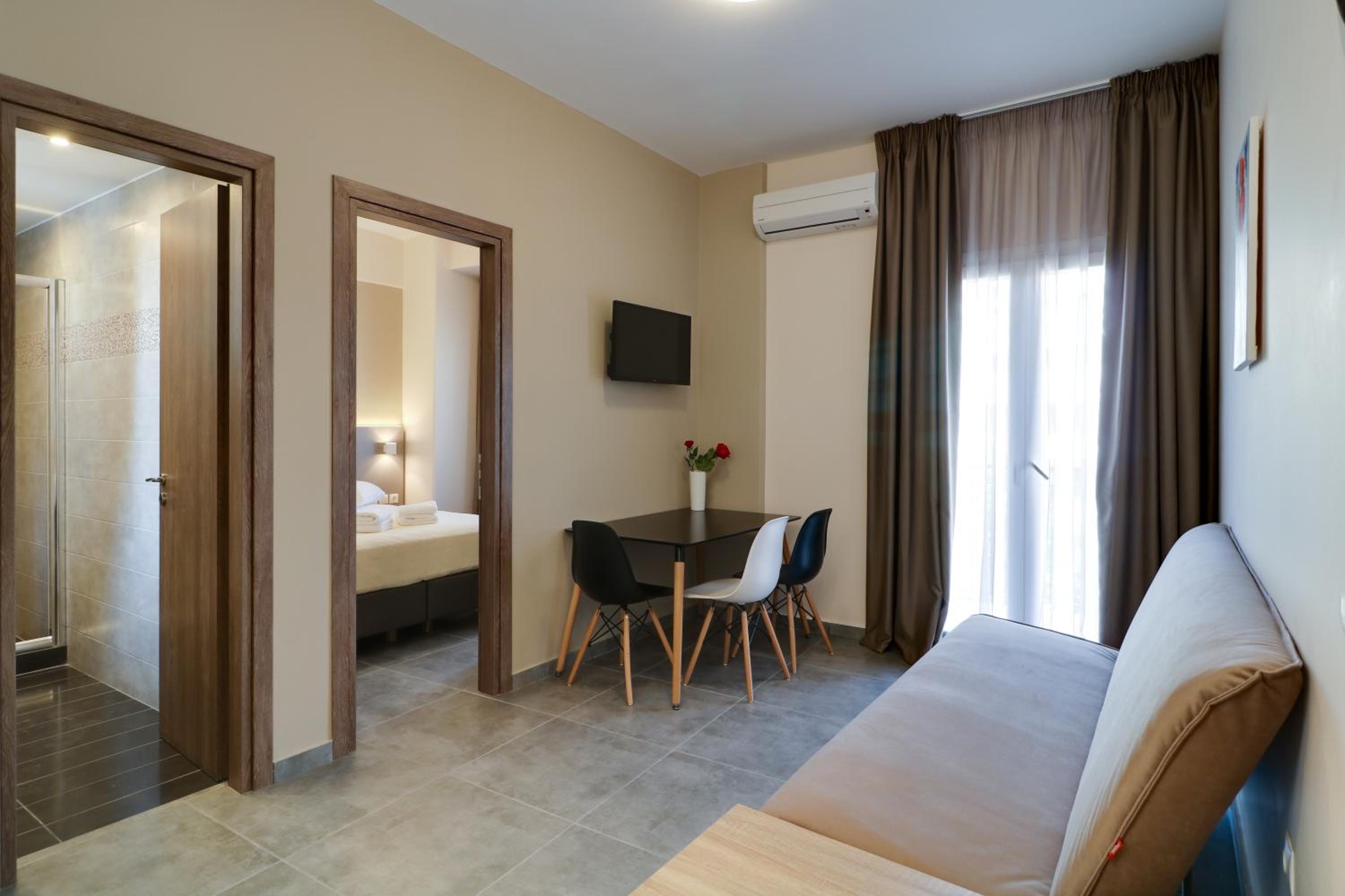 Фото Athens Comfort Suites And Apartments