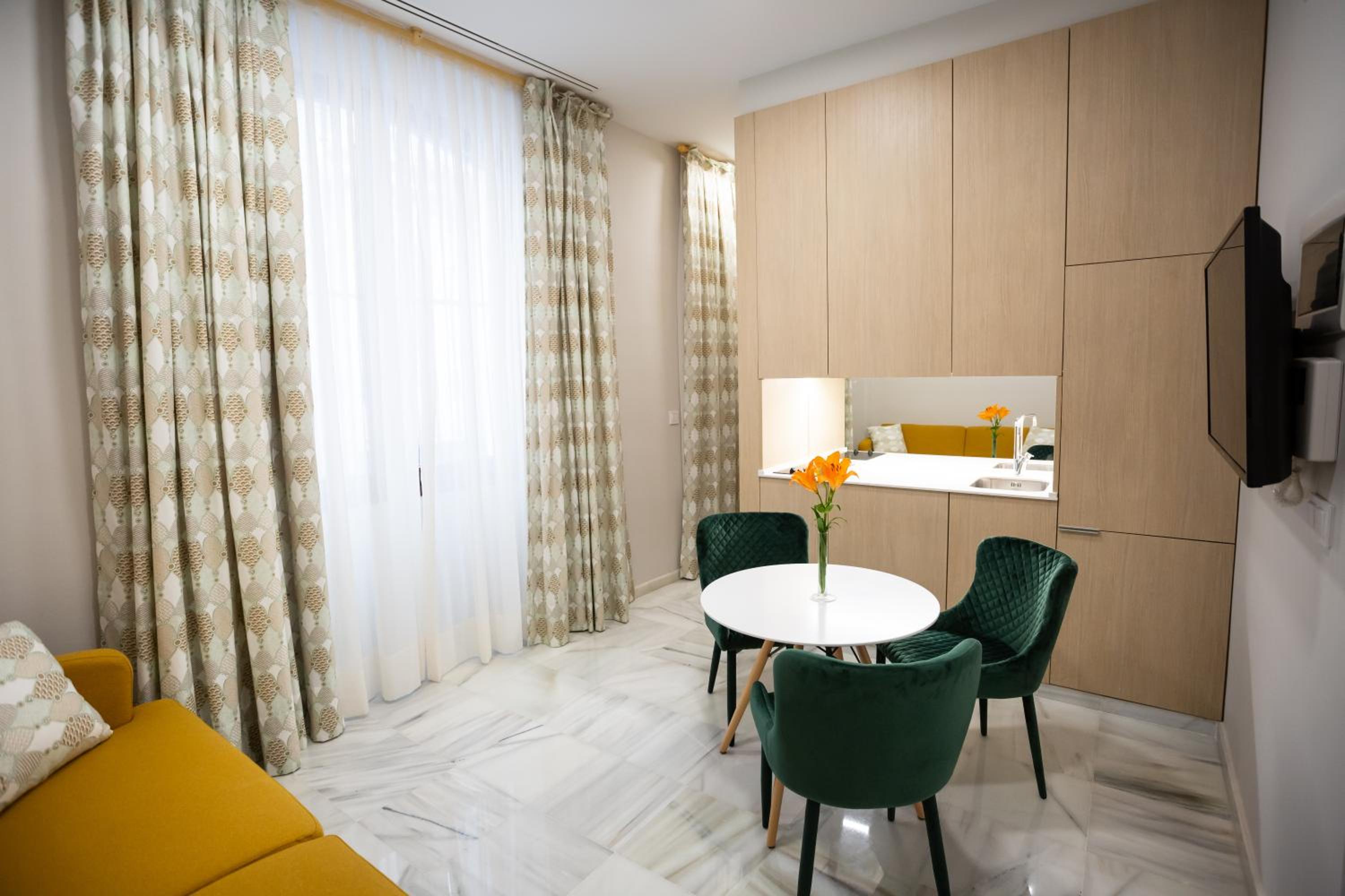 Фото Plazuela del Carbón Suites