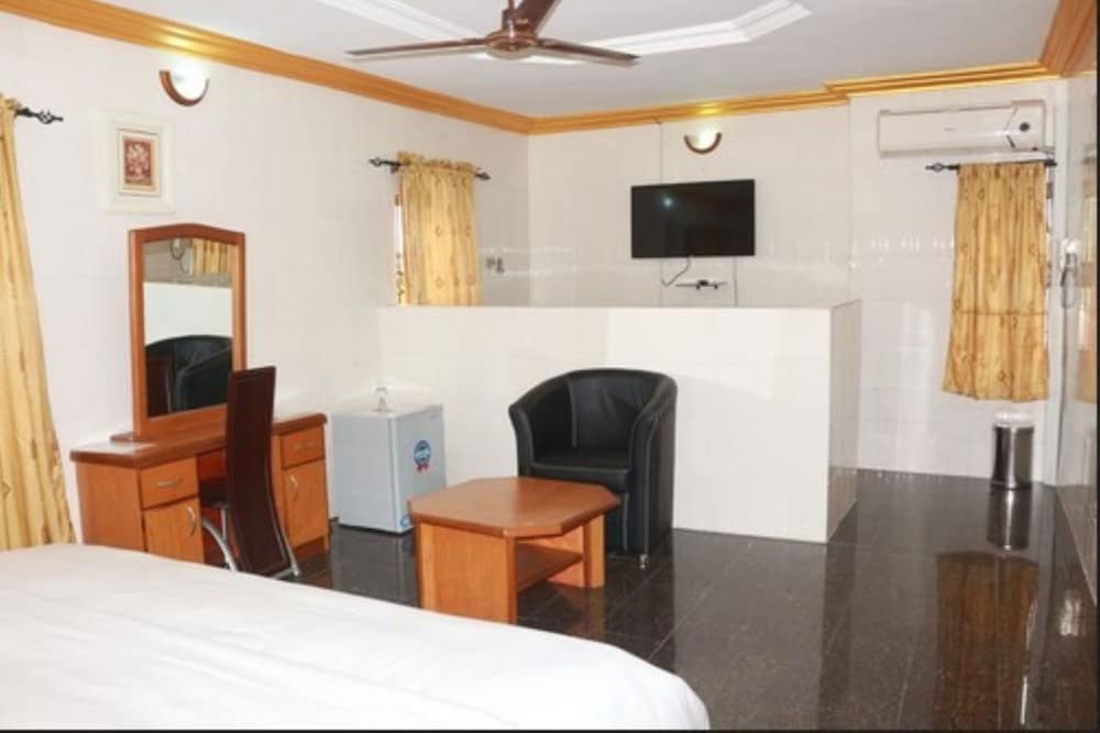 Фото Cute Villa Hotel and Suites