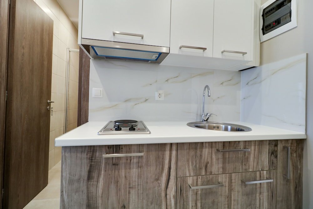 Фото Athens Comfort Suites And Apartments