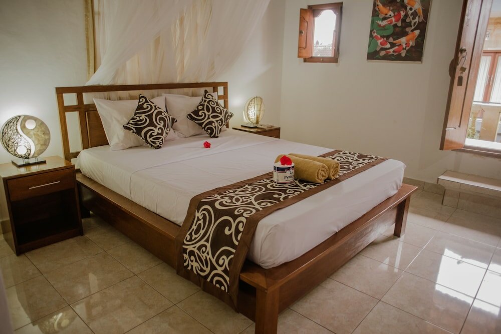 Фото Artha Dewata Home Stay