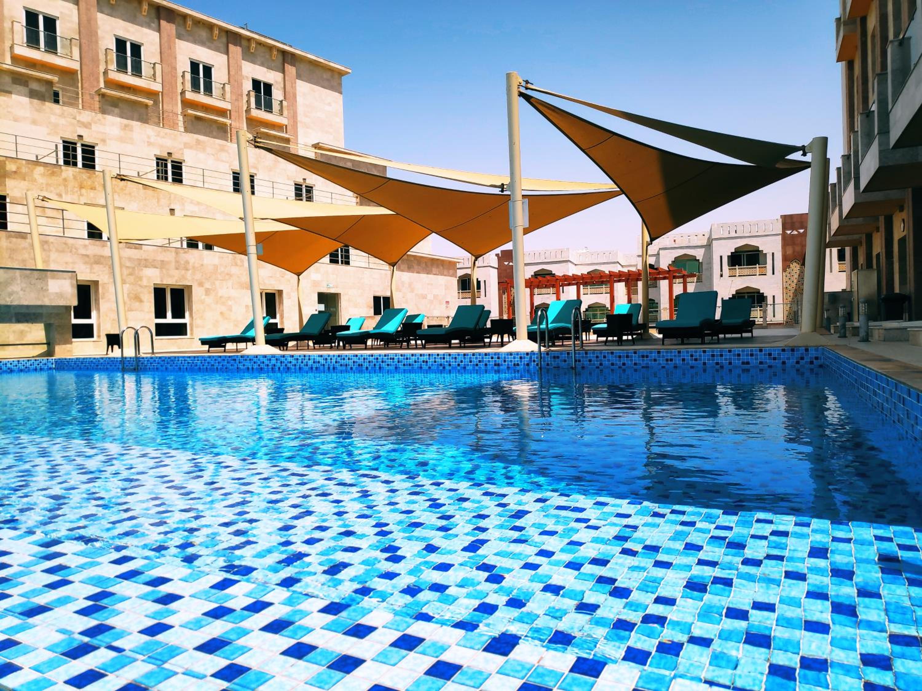 Фото Levatio Suites Muscat, a member of Radisson Individuals
