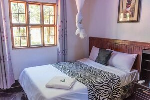 Гостиница Okavango Lodge