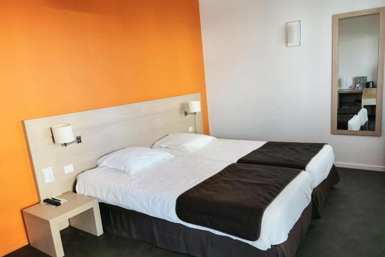 Фото Esatitude Hôtel