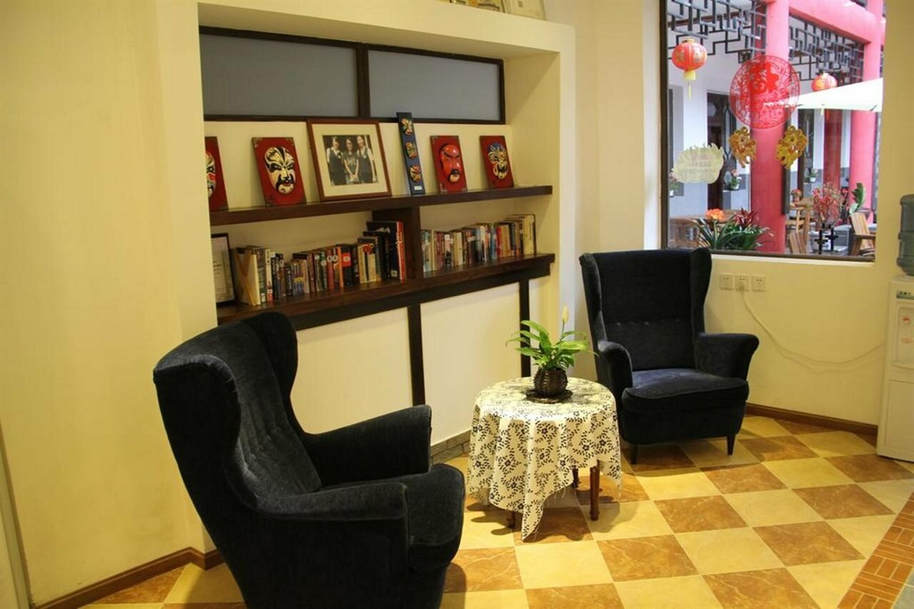 Фото Chengdu Wenjun courtyard Hotel