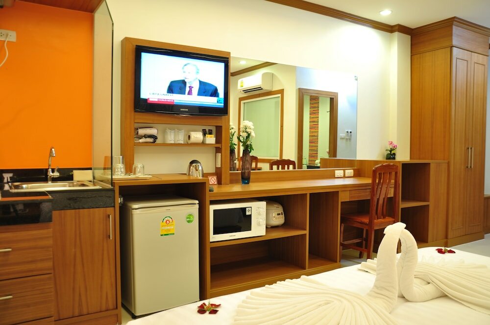 Фото Green Harbor Hotel & Service Apartment