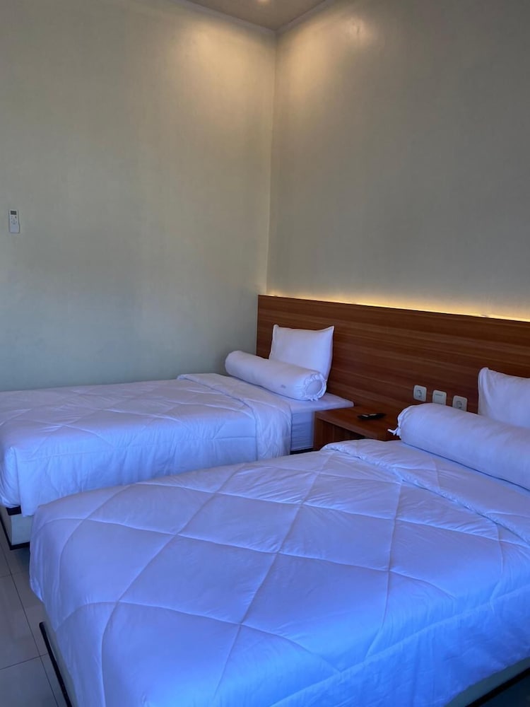 Фото Genio Syariah Hotel Solo