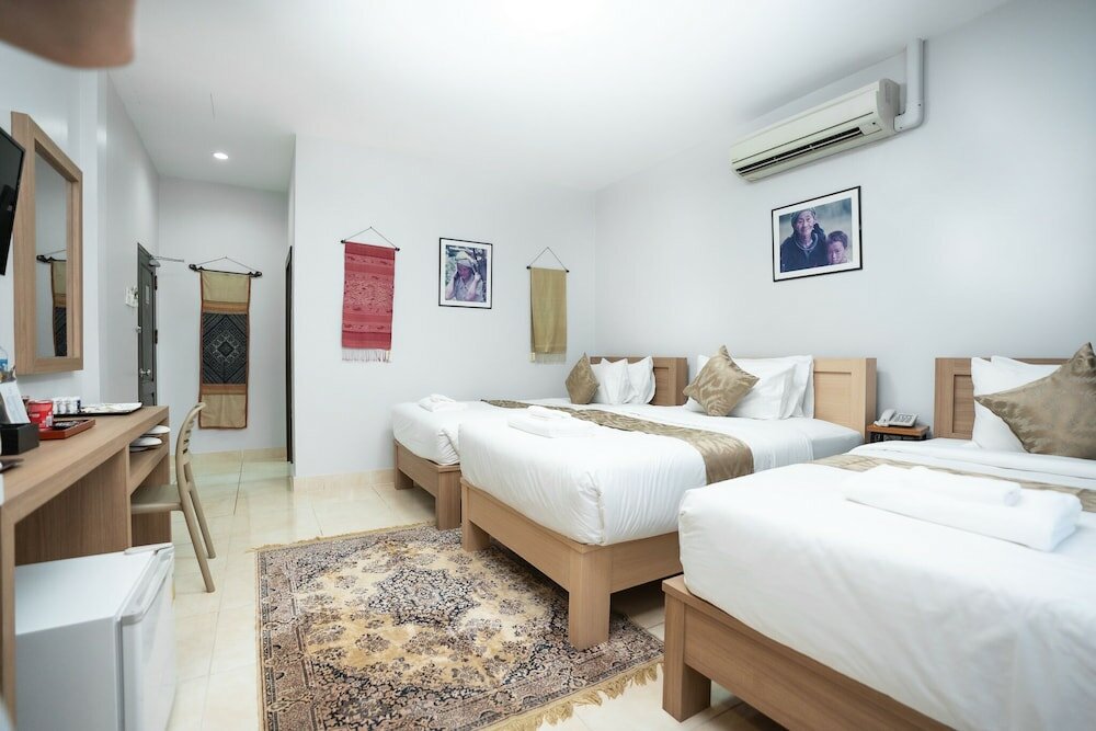 Фото Vongkhamsene Boutique Hotel