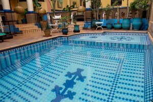 Гостиница Amani Hotel Suites & SPA