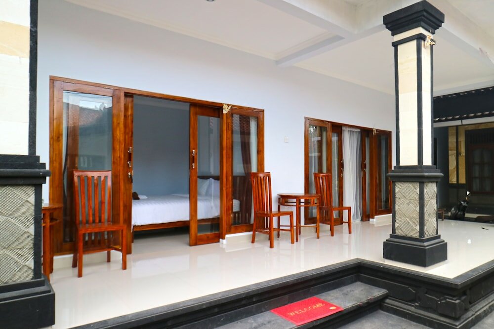 Фото The Wina Echo Beach Guesthouse