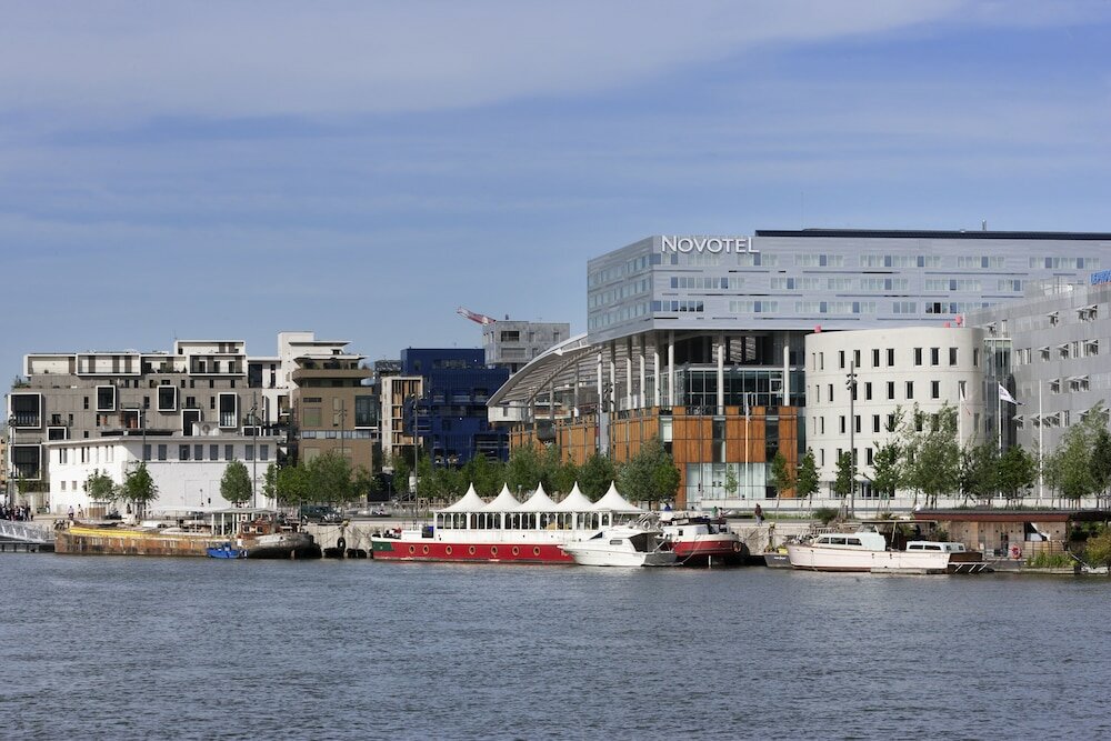 Фото Novotel Lyon Centre Confluence Bord de Saone