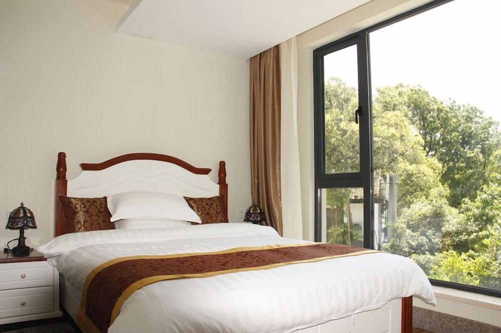 Фото QiaShe Hotel HangZhou