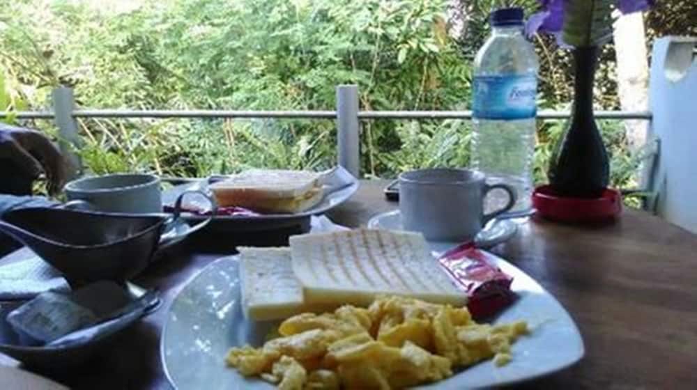 Фото Omah D'Taman Hotel by Eps