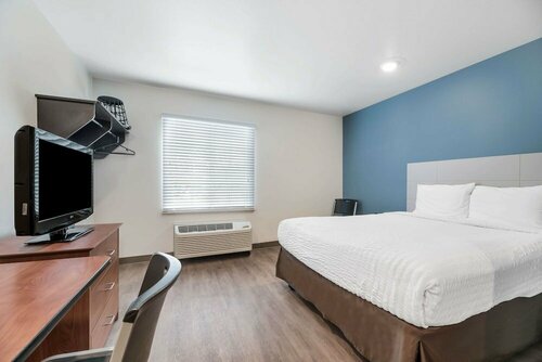 Гостиница WoodSpring Suites Orlando East в Орландо