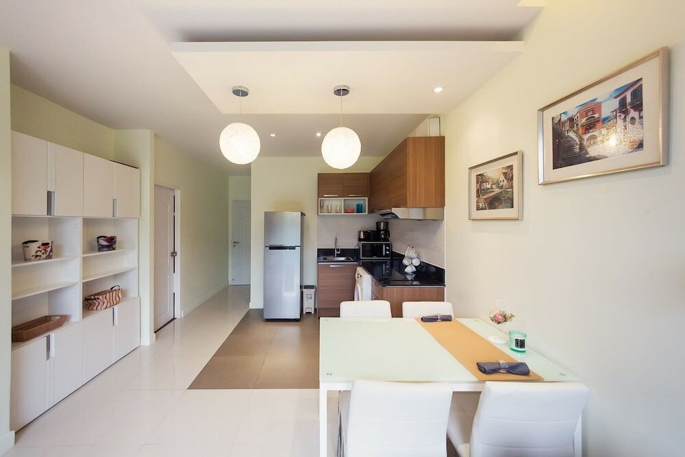 Фото The Lago Apartments by Tropiclook