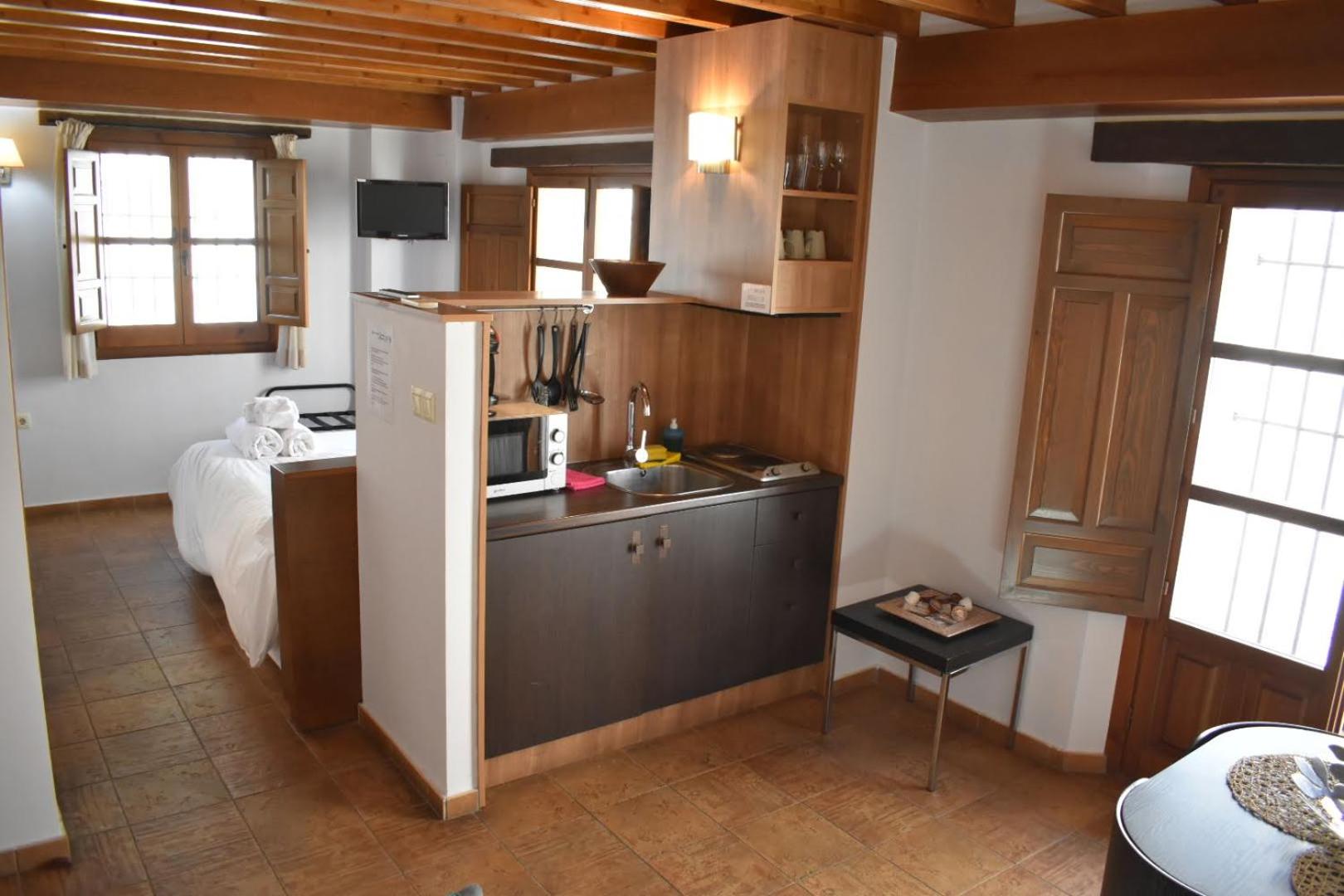 Фото Apartamentos Turisticos Alhambra