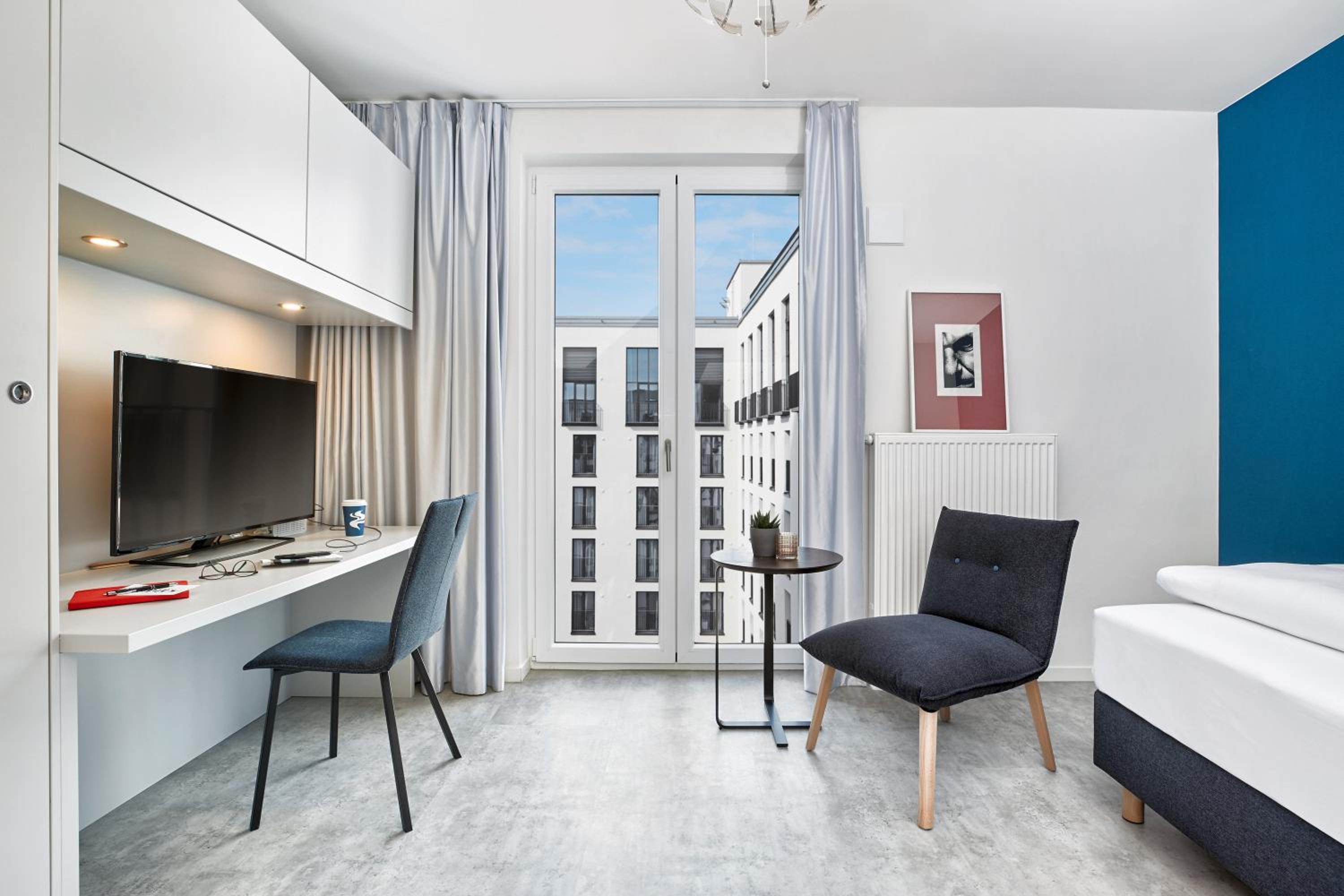 Фото H. ome Serviced Apartments München