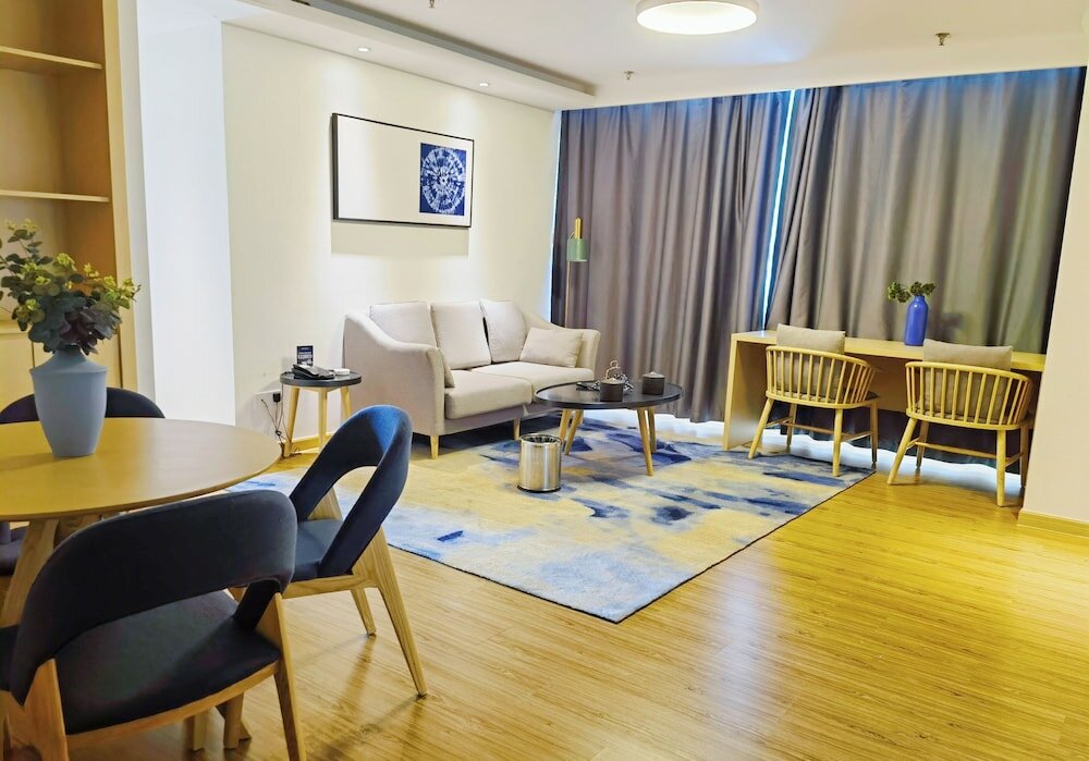 Фото Joysuites Nantong