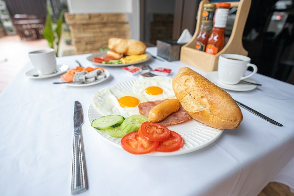 Фото Vongkhamsene Boutique Hotel