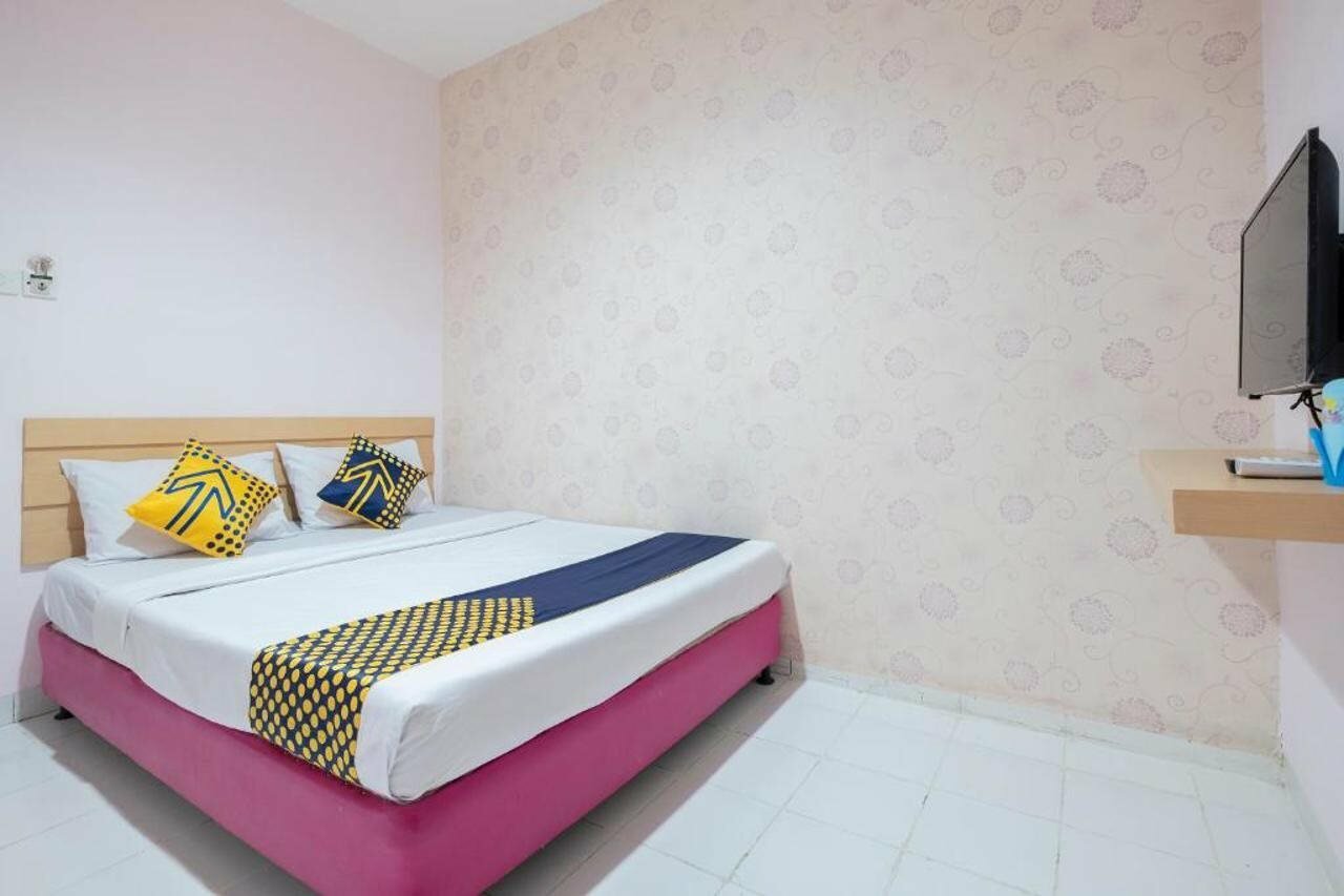 Фото Spot On 2214 Wisma Jampea